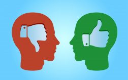 Side profile two men with thumbs up and thumbs down hand symbols inside head isolated on blue background